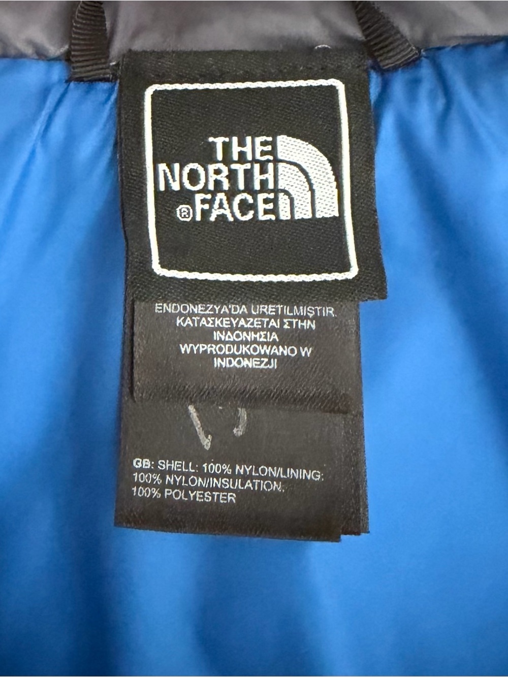 The North Face Men's Dark Gray Puffer Vest with Blue Accents - Picture 5 of 5